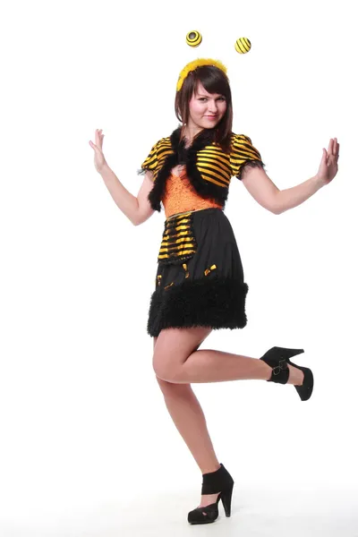 Giovane donna emotiva vestita da ape Foto Stock