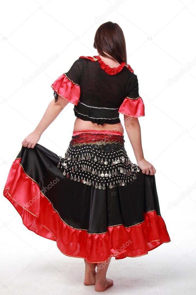 Attractive young woman in costume on white background