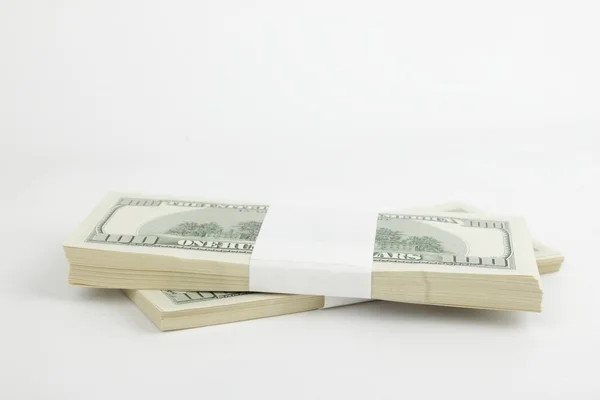 Two stacks of one hundred dollars — Stock Photo, Image