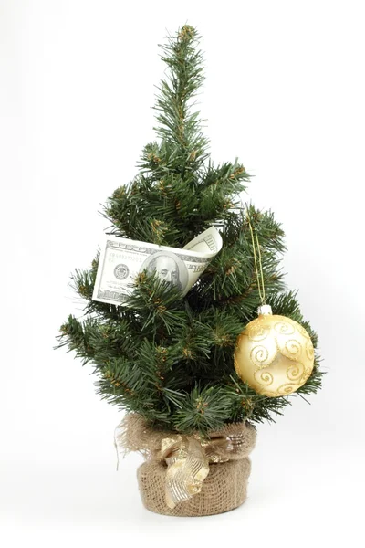 Noel ağacı Doları bill ve oyuncak topu ile dekore edilmiştir. — Stok fotoğraf