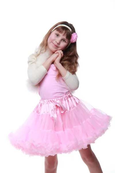 Menina pequena com cabelo longo e saudável em um tutu rosa em Beleza e Moda — Fotografia de Stock