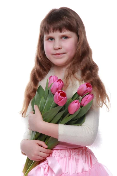 Meisje met bloemen voor Pasen — Stockfoto