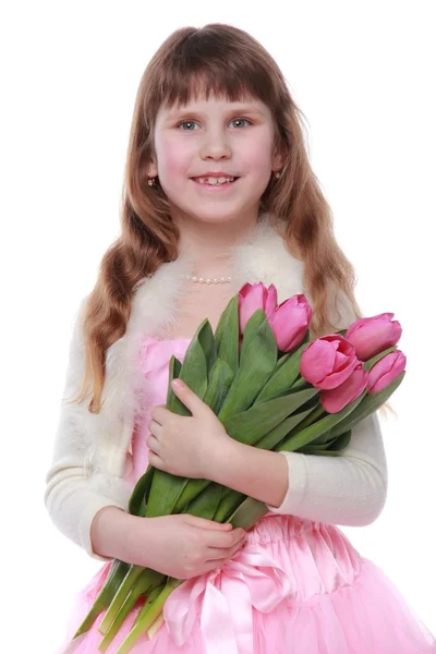 Mädchen mit Blumen zu Ostern — Stockfoto