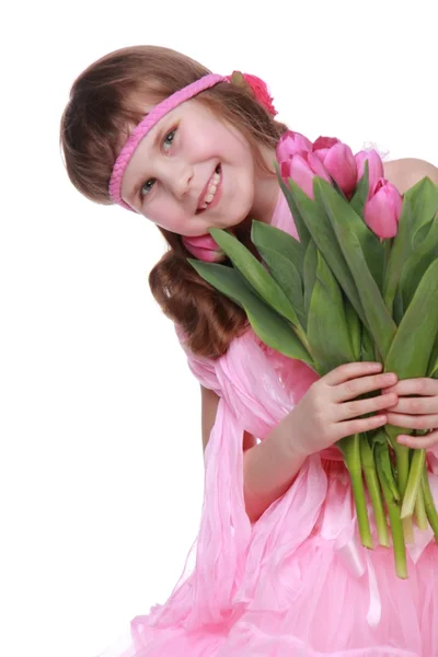 Portret van een klein meisje met een grote boeket — Stockfoto