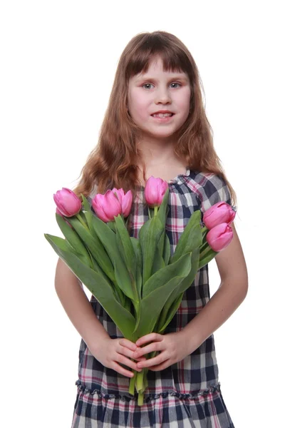 Chica emocional con un ramo de primavera de tulipanes — Foto de Stock