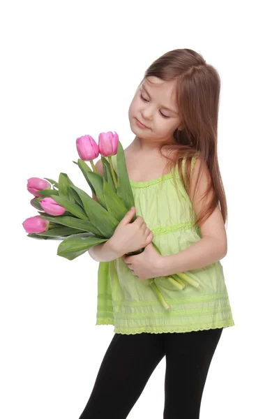 Immagine di un bel bambino con un mazzo di tulipani — Foto Stock