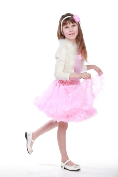 Mooi kind in een tutu poseren voor de camera — Stockfoto