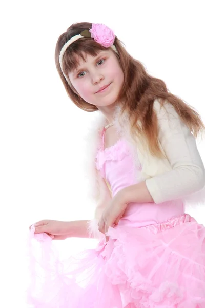 Klein meisje in een tutu poseren voor de camera — Stockfoto