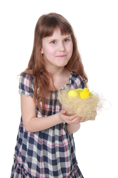 Pretty little girl holding an Easter decoration — Stock Photo, Image