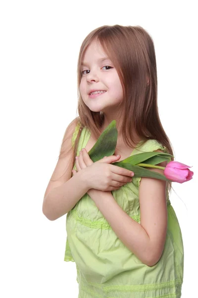 Immagine di un bel bambino con un tulipano — Foto Stock