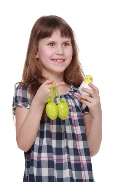 Beautiful girl holding an Easter decoration — Stock Photo, Image