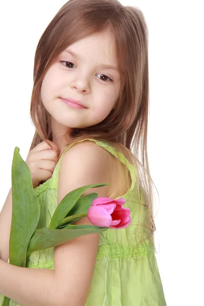 Retrato de uma menina bonita com tulipa — Fotografia de Stock