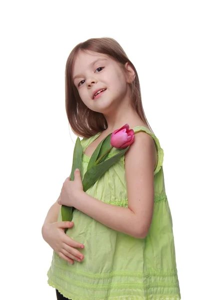 Πορτρέτο ενός μικρού κοριτσιού με τουλίπα — Φωτογραφία Αρχείου