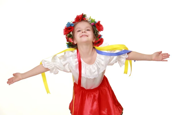 Klein meisje in Oekraïense nationale kostuum dansen — Stockfoto