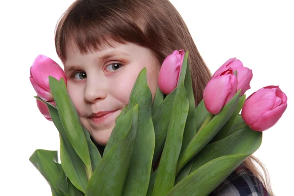 一个小女孩用一束郁金香的肖像 — 图库照片