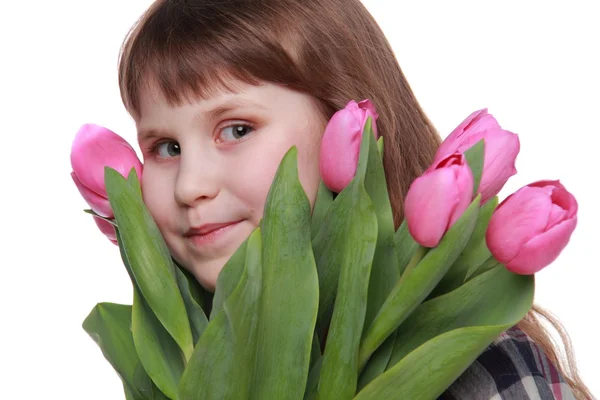 チューリップの花束を持つ少女の肖像画 — ストック写真