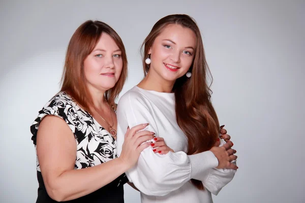 Happy mother with a young daughter — Stock Photo, Image