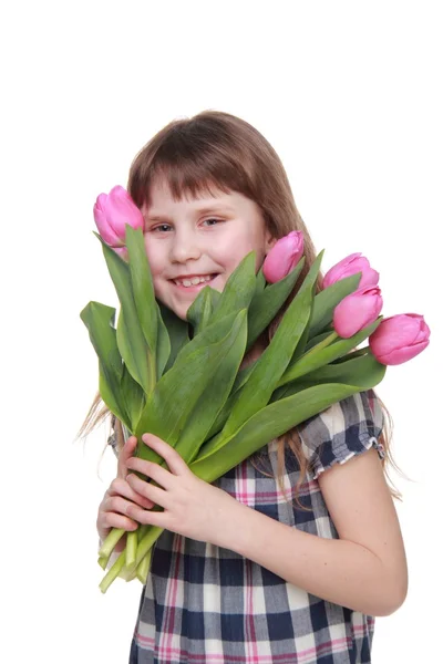 Portrait of a little girl with a bouquet of tulips — Stock Photo, Image