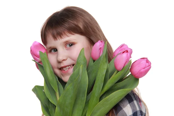 Retrato de uma jovem segurando belas tulipas — Fotografia de Stock