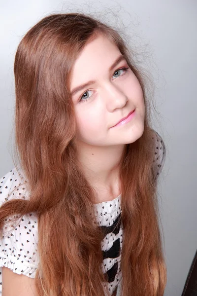 Beautiful young girl with long hair — Stock Photo, Image