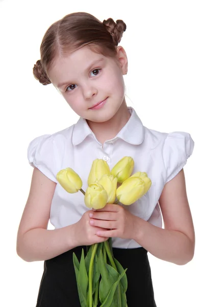 Anime schoolgirl met een boeket van tulpen — Stockfoto