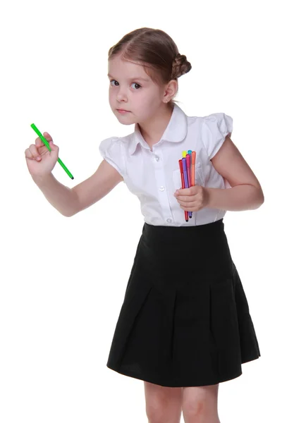 Studio portret van schoolmeisje met viltstiften — Stockfoto