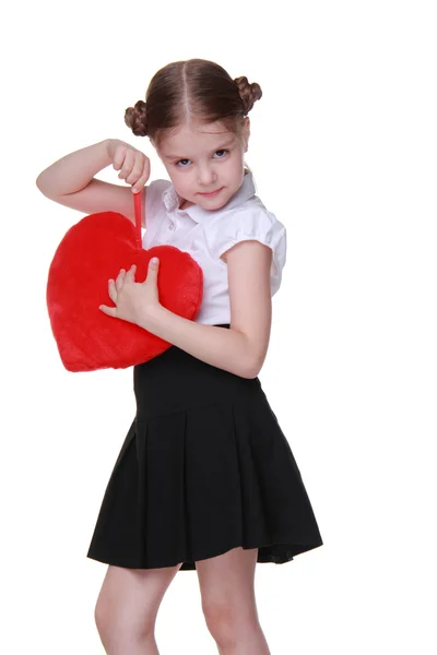 Estudante caucasiana com símbolo de coração vermelho — Fotografia de Stock