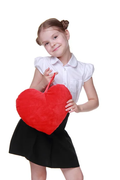 Colegiala caucásica con símbolo de corazón rojo — Foto de Stock