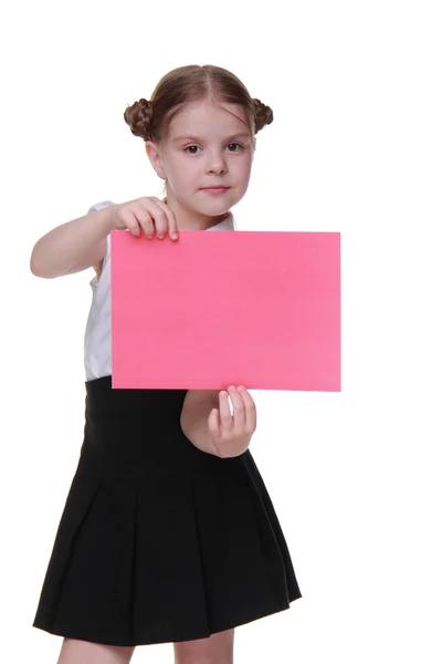 Šťastný školačka s listem papíru — Stock fotografie