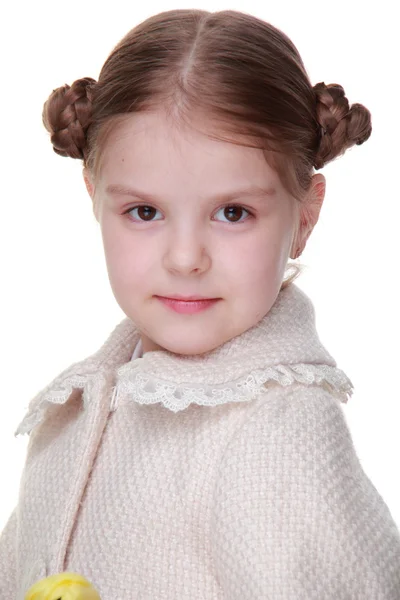 Studio portret van een klein meisje in een vacht — Stockfoto