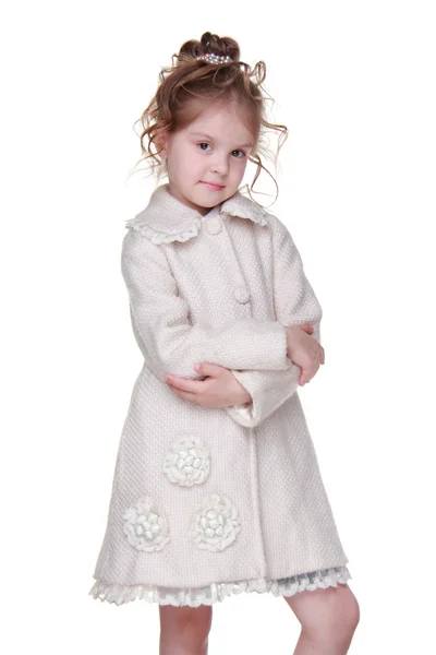 Όμορφο κοριτσάκι σε ένα ελαφρύ παλτό — Φωτογραφία Αρχείου