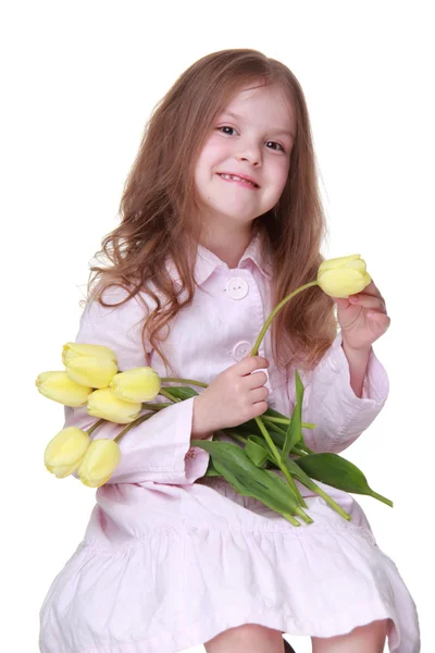 可爱的小女孩，在一束郁金香连衣裙 — 图库照片