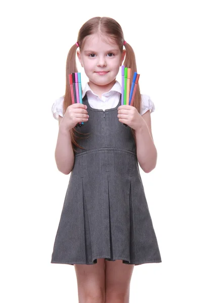 Studio portrait of schoolgirl with felt-tip pens — Stock Photo, Image