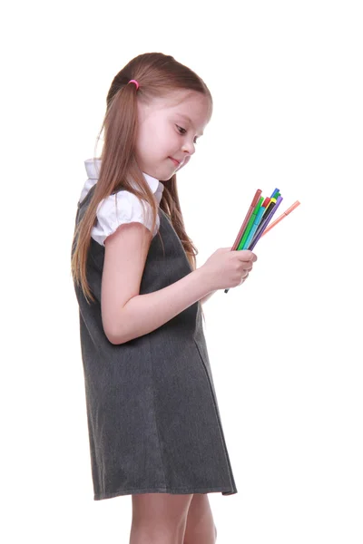 Studio porträtt av skolflicka med fiberpennor — Stockfoto