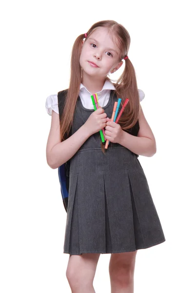 Studio portrait of schoolgirl with felt-tip pens — Stock Photo, Image