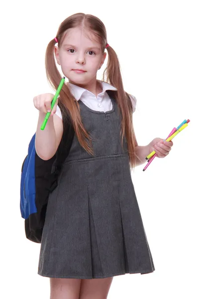 Studio portrait of schoolgirl with felt-tip pens — Stock Photo, Image