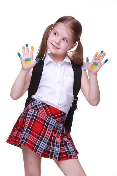 Happy little girl with hands painted as ukrainian flag — Stock Photo, Image