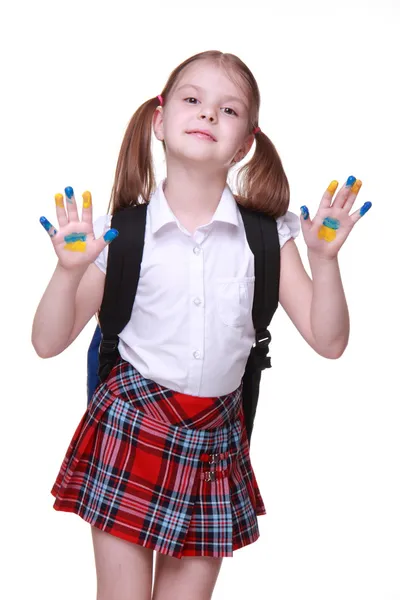 Happy little girl with hands painted as ukrainian flag — Stock Photo, Image