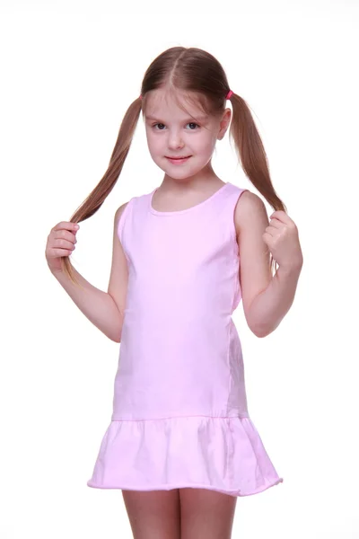 室画像的粉红色裙子的小女孩 — 图库照片