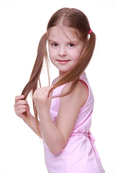 室画像的粉红色裙子的小女孩 — 图库照片