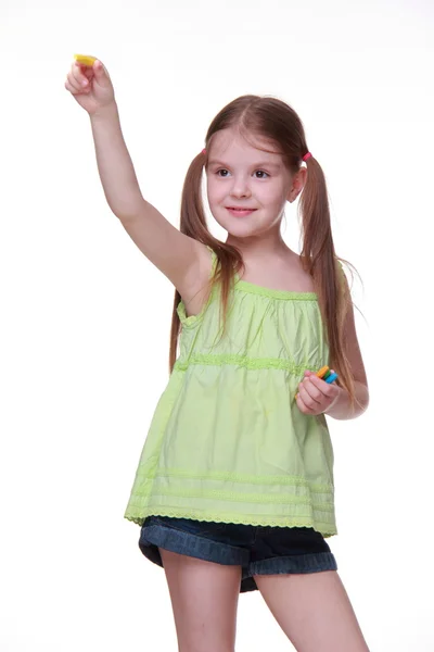 Little girl with color chalks — Stock Photo, Image