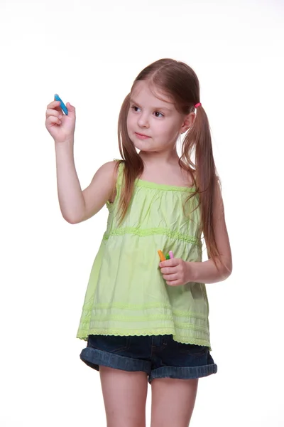 Little girl with color chalks — Stock Photo, Image