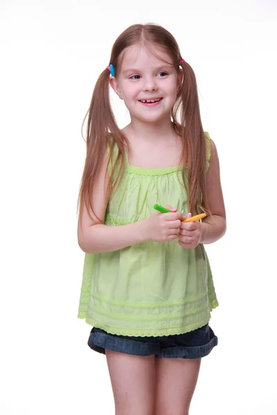 Little girl with color chalks — Stock Photo, Image