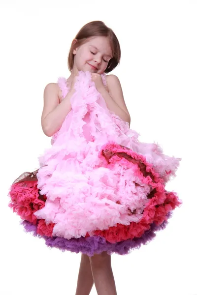 Hermosa niña en un precioso vestido rosa aislado sobre un fondo blanco — Foto de Stock