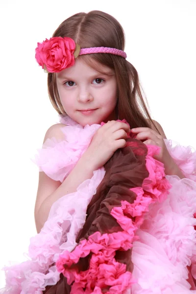 Retrato de uma menina em um vestido rosa — Fotografia de Stock