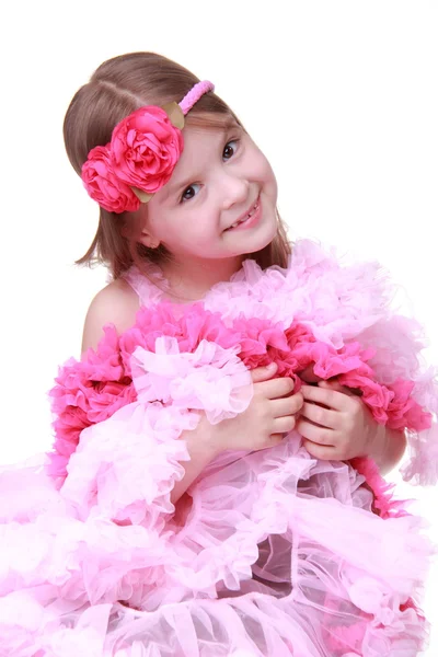 Portrait of a little girl in a pink dress — Stock Photo, Image