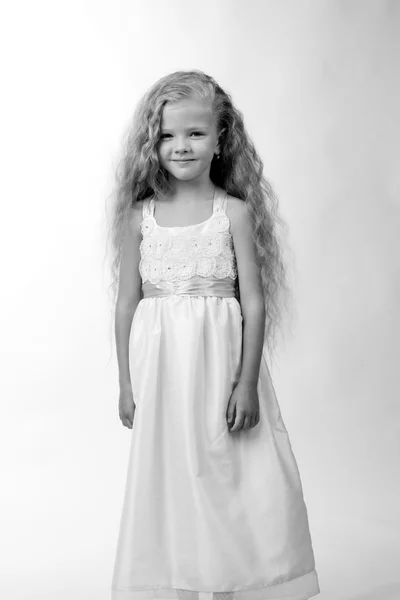 Black and white studio image of beautiful caucasian little girl — Stock Photo, Image