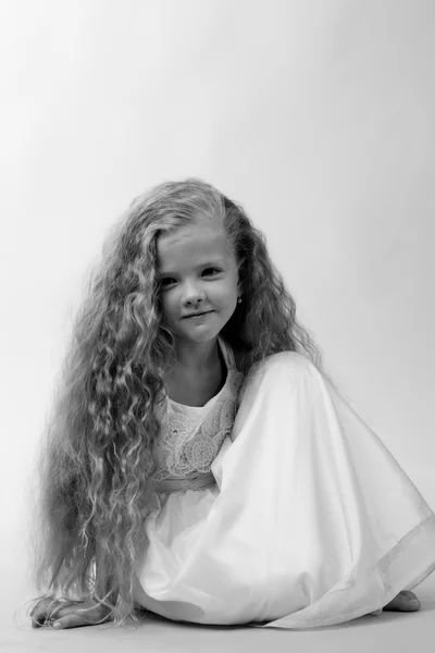 Black and white studio image of beautiful caucasian little girl — Stock Photo, Image