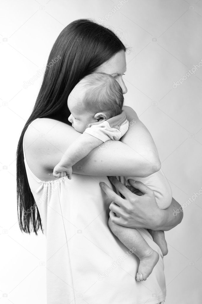 Black and White Art photo of beautiful mother holding baby boy