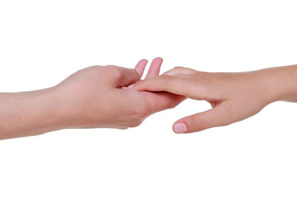 Two caucasians hands holding each other